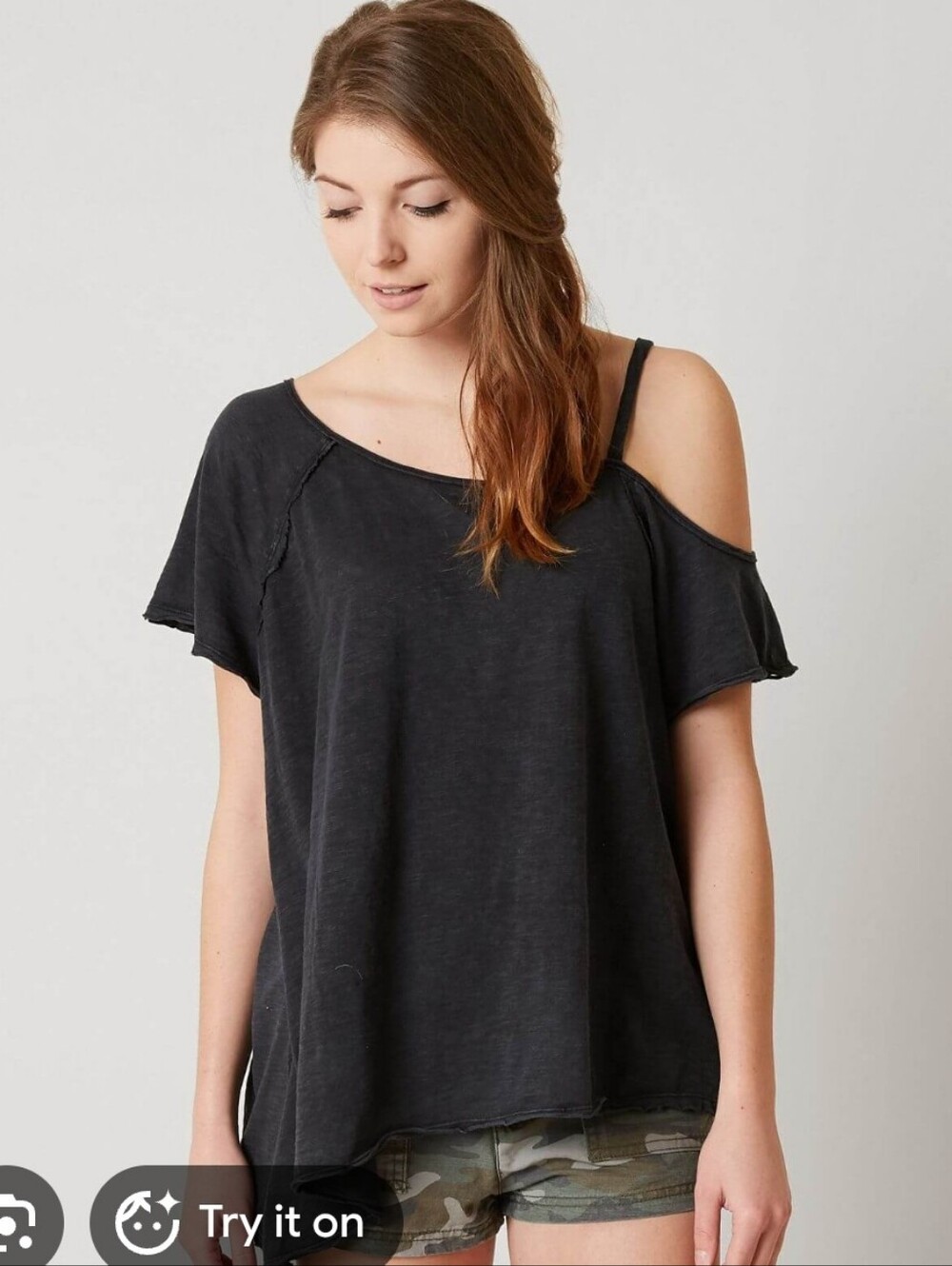 Free People Coraline T-shirt featuring a distinctive cold-shoulder